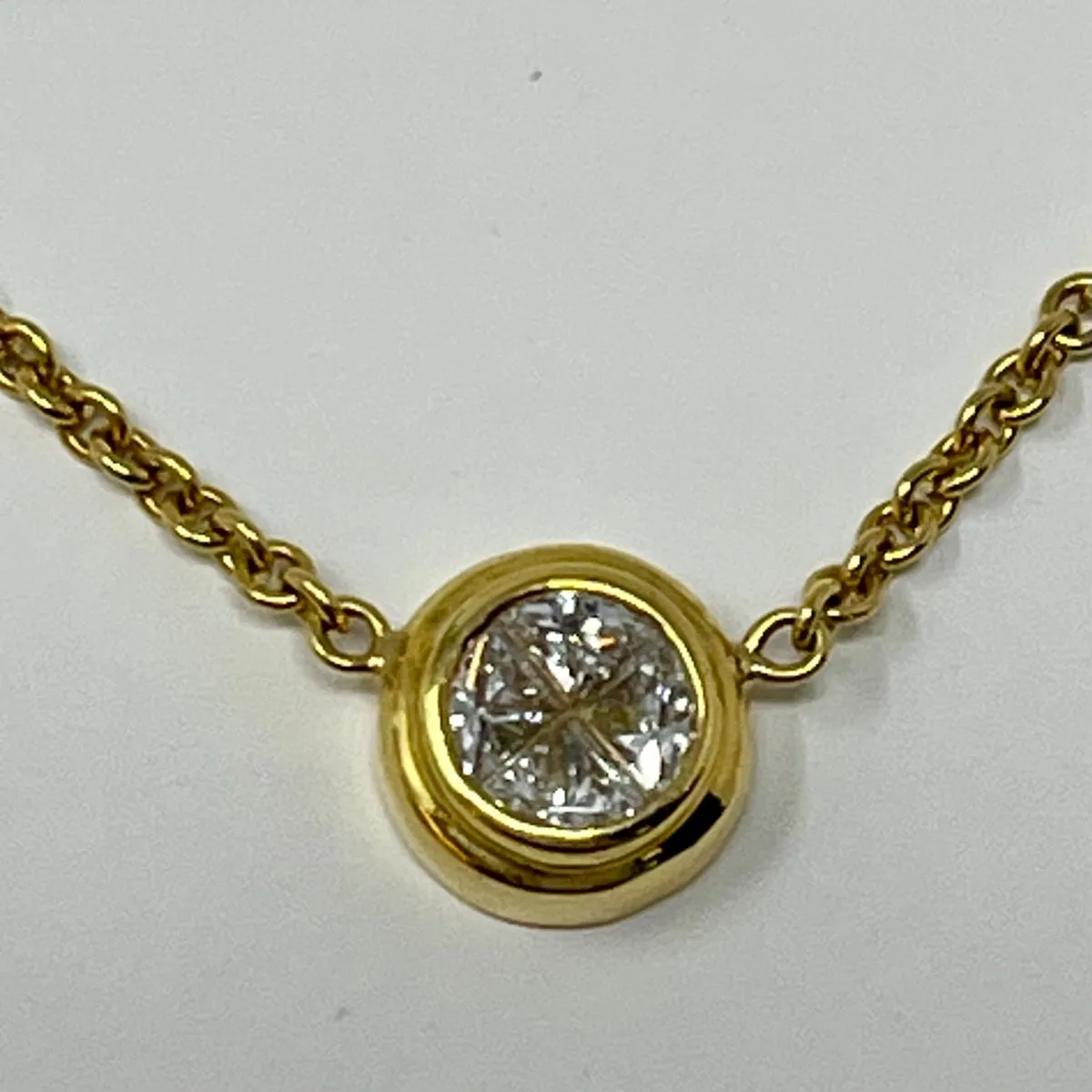 18K Gold Necklace with Invisibly Bezel Set 4 Triangular Shaped Diamonds