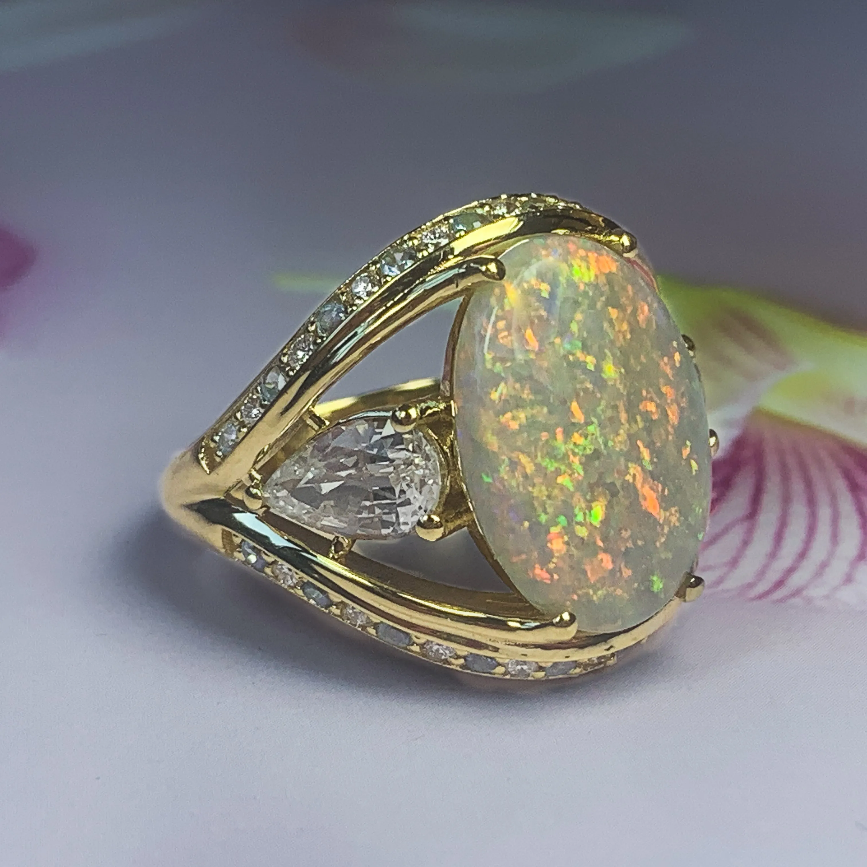 18kt Yellow Gold Black Opal, Sapphire, Aquamarine and Diamond ring