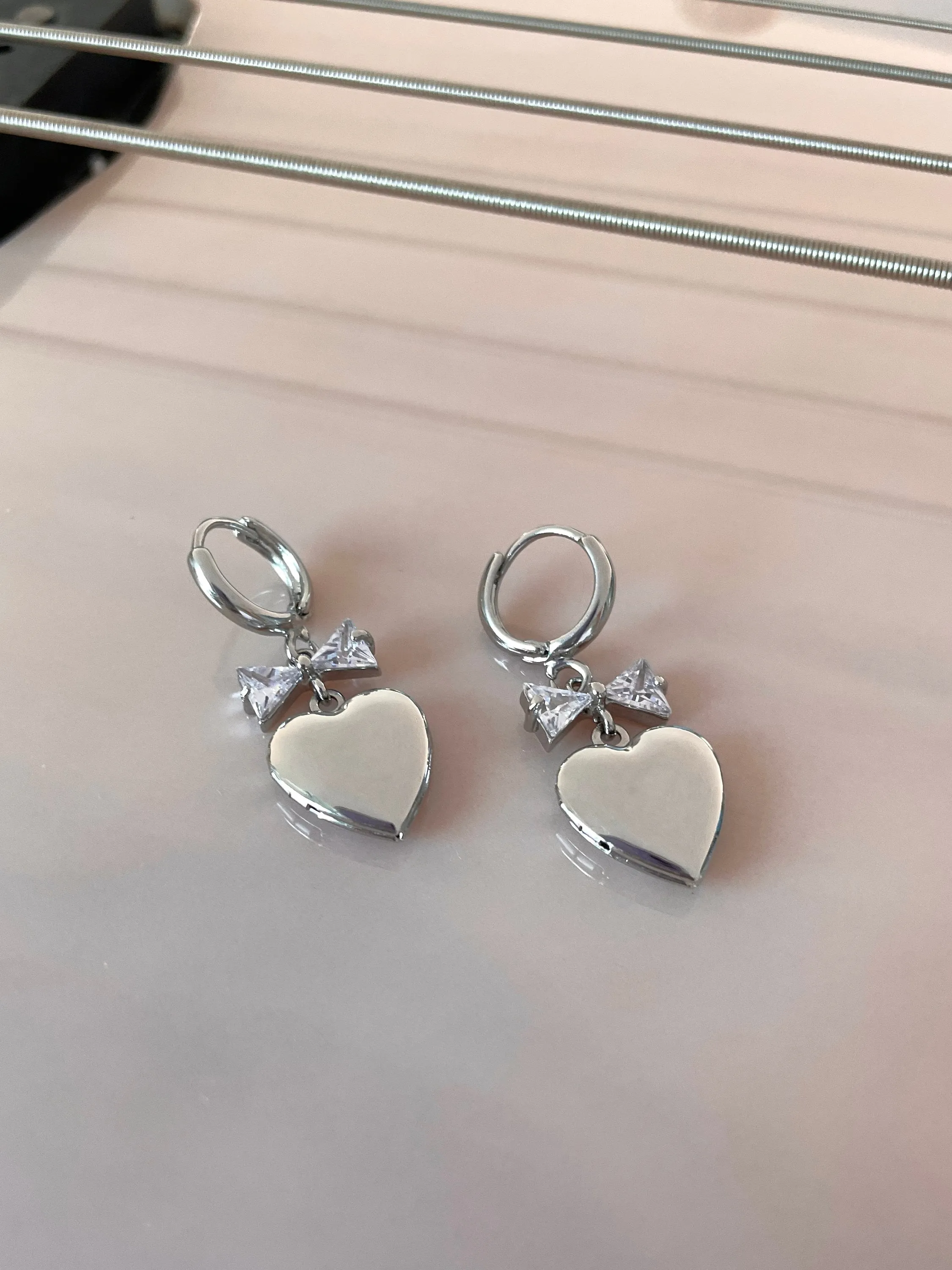 Meri Heart Locket Bow Earrings