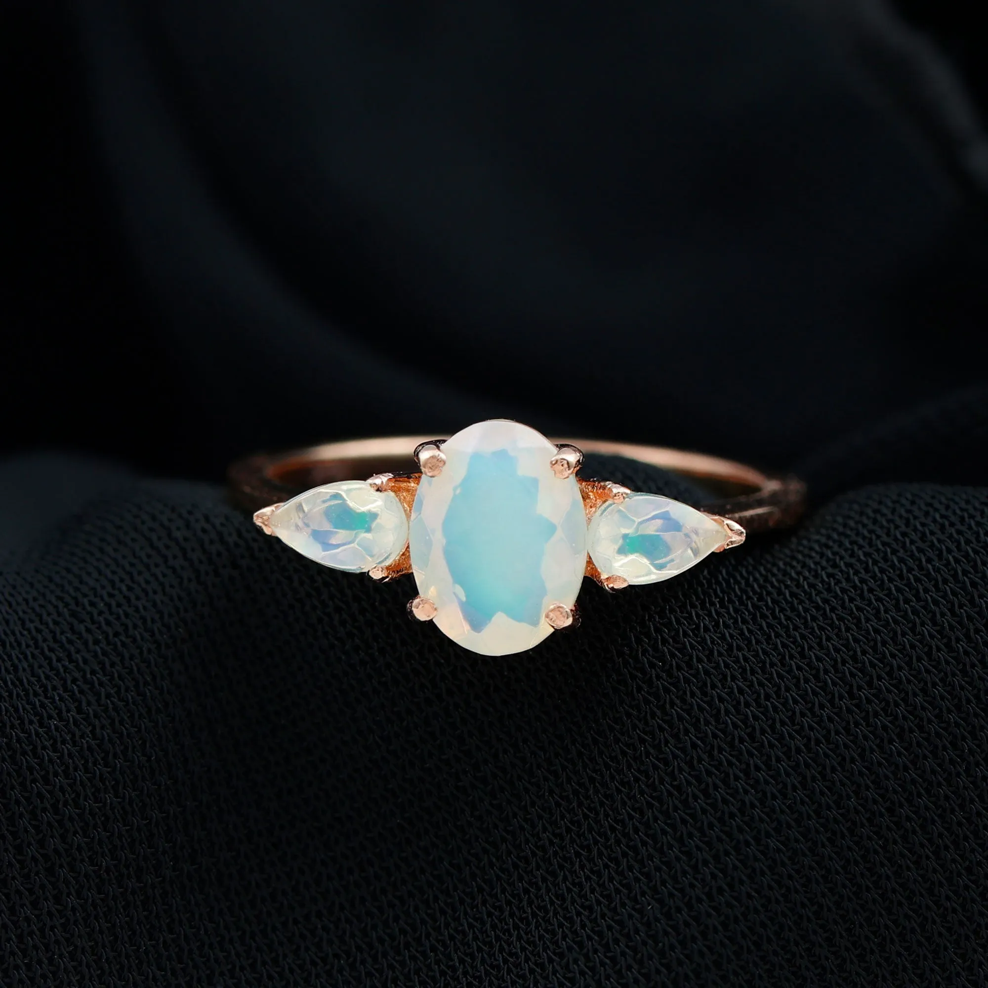 Oval and Pear Cut Ethiopian Opal Three Stone Ring