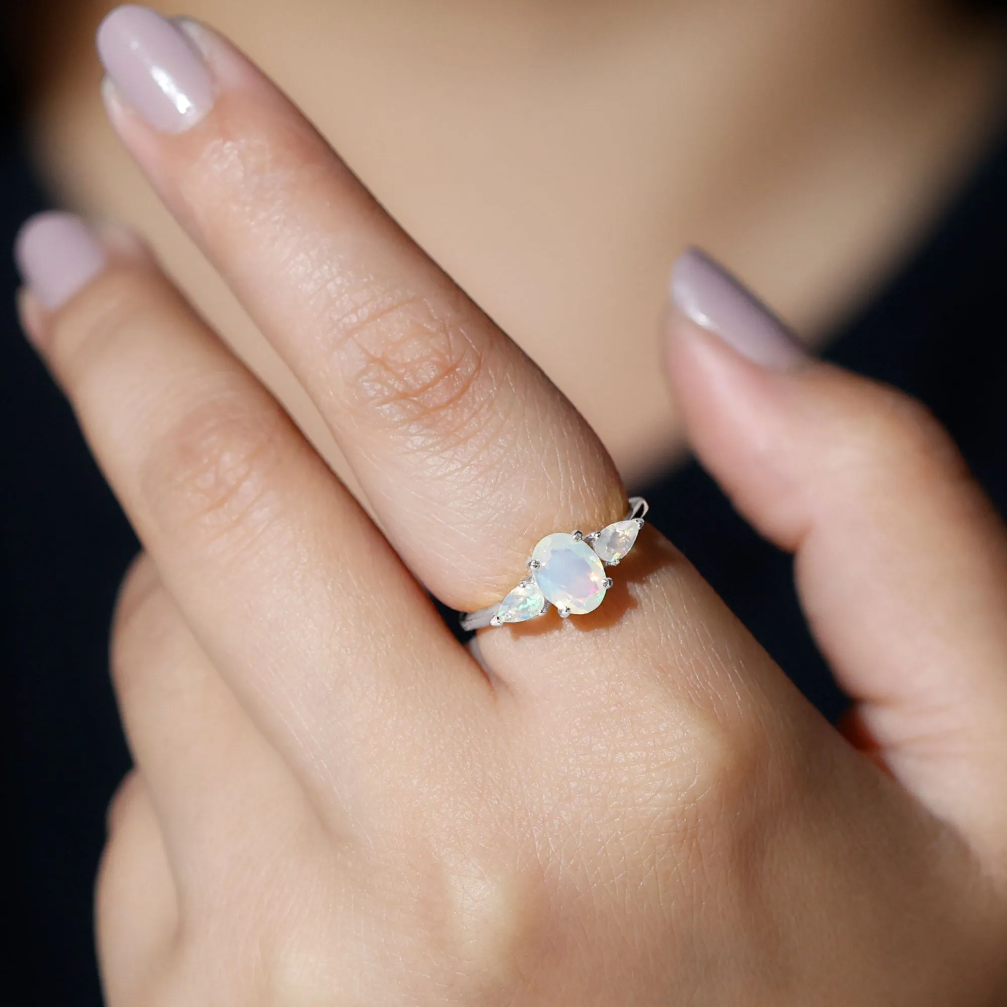 Oval and Pear Cut Ethiopian Opal Three Stone Ring