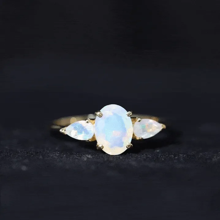 Oval and Pear Cut Ethiopian Opal Three Stone Ring