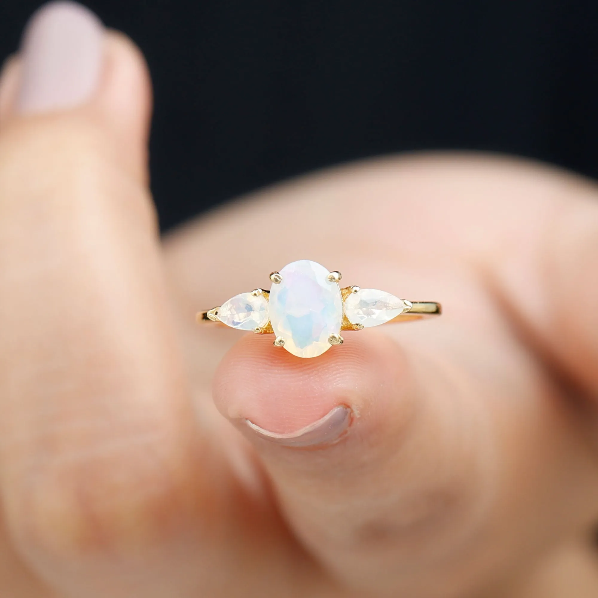 Oval and Pear Cut Ethiopian Opal Three Stone Ring