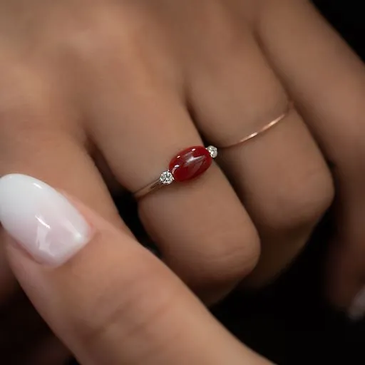 Oval Coral Cabochon and Diamond Ring