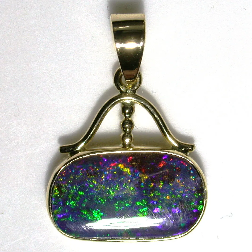 Red over green solid boulder opal Pendant